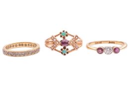 Three rings; comprising a diamond-set eternity ring, in brushed yellow metal marked '18K', size H1/2