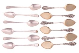 A set of six George III teaspoons, with bright-cut handles and terminals, together with a set of six