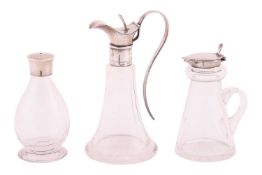 An Edwardian glass and silver-mounted whiskey noggin, Birmingham, 1908, together with a second silve