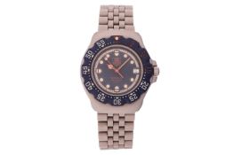 TAG Heuer Formula 1 Wrist Watch Reference: WA1210 Bezel: Bi-directional, Plastic Year: circa 1995 Ca