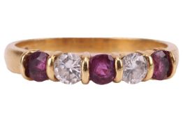 A ruby and diamond-set half-eternity ring, with two round brilliant diamonds and three round-cut rub