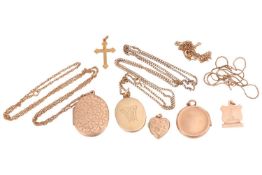 A collection of lockets and pendants with chains, to include; an oval locket with floral engraving s