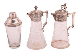 A late Victorian claret jug by Elkington and Co. the silver plated collar decorated with Bacchalian 