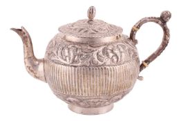 A 19th-century Dutch silver bullet form teapot with bone heat retarders and a mask set loop handle f