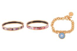 Two Hermes bangles and a Mulberry bracelet; the Hermes bangles, of closed, circular form, width appr