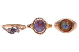 Three gem-set rings; comprising a collet-set opal ring, a quartz intaglio, partially deficient, and 