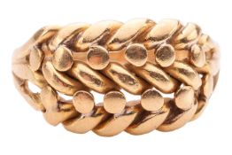 An Edwardian dress ring in 18ct yellow gold, of braided design, to a tapering D-profile shank, Birmi