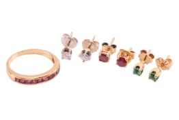 A collection of gem-set jewellery; comprising a pair of ruby set stud earrings in yellow metal testi