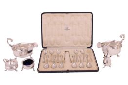 A pair of George III style silver sauce boats, Edinburgh 1975 by Hamilton & Inches, a silver thr