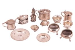 A mixed group of silver items comprising a pair of salts, of shell design on ball feet, hallmarked C
