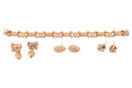 Three pairs of yellow metal earrings and a bracelet; comprising a pair of bow earrings with a drop o