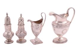 A Victorian silver milk jug, with foliate chased border to body and foot and engraved circular motif