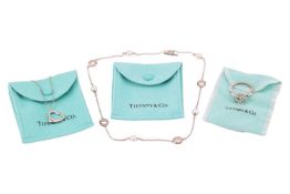 Tiffany & Co. - a cultured pearl necklace, an 'Open Heart' pendant necklace by Elsa Peretti and 