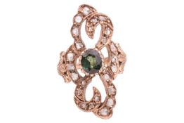 A green sapphire and diamond panel ring, the scrolled openwork panel with scalloped edges is encrust