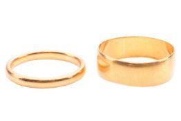 Two 22ct yellow gold wedding rings; to include a thin comfort-fit polished plain band, interior of t