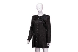 Yves Saint Laurent - a dress coat in black jacquard, round neckline with four faux pockets and rhine