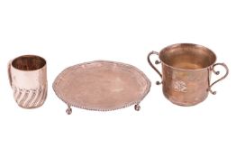 A small group of silver items comprising a Victorian tankard, with a gadrooned lower body and gilt i