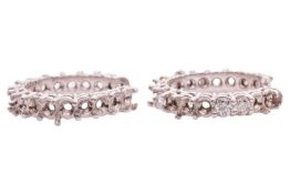 A pair of hoop earring mounts and 4 loose diamonds; each hoop with 18 four-claw settings, set with 6