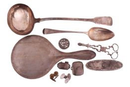 A mixed group of items comprising a silver George III fiddle pattern soup ladle, a pair of silver su