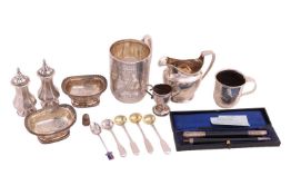 A mixed group of silver items; comprising a Victorian tankard, featuring floral and scroll detailing