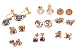 A collection of nine pairs of earrings; to include a pair of cultured pearl stud earrings in yellow 