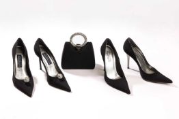 Stuart Weitzman - two pairs of pointed heels in black (size 8); together with matching evening bag. 