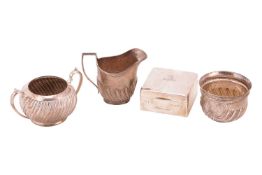 A Victorian small silver bowl, London 1885 by Goldsmiths & Silversmiths Co, 9 cm wide, together 