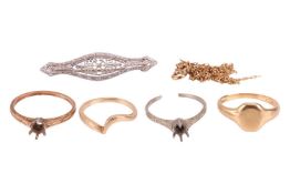 A small group of jewellery items; comprising a filigree brooch, in white metal marked '14K'; a yello