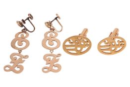 A pair of pendant earrings and a pair of cufflinks; the earrings pierced with the cursive letter 'EZ