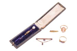 A pearl stick pin, gem-set rings and brooches; the stick pin set with a 7.15 mm white pearl, pin sur