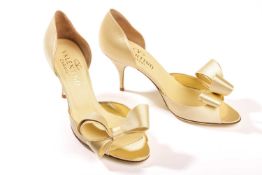 Valentino Garavani Couture - a pair of lacca bow peek-a-boo toe pumps in pale lemon satin. (size 38)