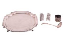 A George V silver salver of shaped square form, London 1935 by Saunders, Shepherd and Co Ltd, 23 cm 