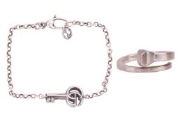 Gucci - a Chiodo nail ring in silver, signed and stamped with Swiss convention marks, size M; a Doub