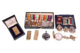 A group lot of items comprising a gilt Dunhill lighter, in associated box; an additional gilt Dunhil