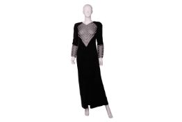 Valentino - a maxi evening gown in black velvet, circa 1980s, boutique label, with chiffon inserts t