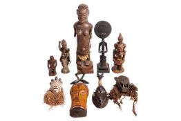 Six various African Tribal carvings including a Luba Witch Doctor figure, 47 cm high, and two Ivory 