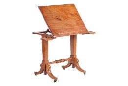 A George IV mahogany Architect's Table, the rectangular adjustable slope top with moulded edge, book