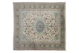 An ivory ground Isfahan carpet, 20th century, with stylised 