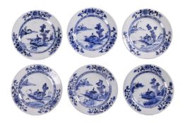 A set of six Chinese Qianlong blue and white porcelain circular side plates, painted with river land