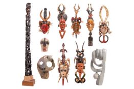 Collection of African tribal carvings, Songye, Namibian, and Zimbabwe, and two hardstone carved scul