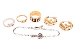 A small collection of designer brand jewellery; to include a Gucci Chiodo nail ring in silver, signe
