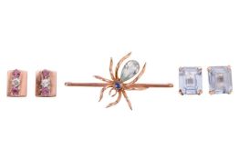 A gem-set spider brooch, a pair of topaz earrings and a pair of synthetic ruby and diamond earrings;