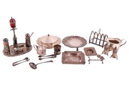 An Art Deco silver butter dish and cover, dodecagonal with everted pierced border and frosted glass,