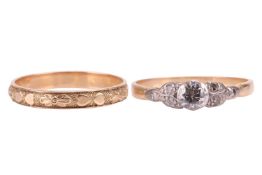 Two rings; comprising a diamond-set ring, featuring a central round brilliant cut diamond leading to