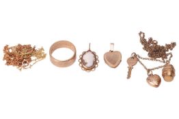A small collection of jewellery items; including a polished flat wedding band with personal message 