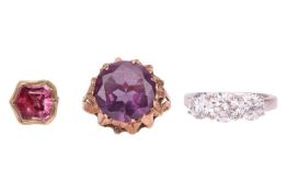 A small group of jewellery items comprising a CZ-set three stone ring, in a platinum mount, size M1/