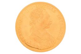 An Austrian 1915 four ducat gold coin, 14 grams, 38 mm diameter