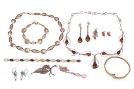 A group of costume jewellery, to include an imitation-amber drop necklace in white metal marked ‘925