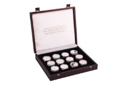 A silver coin set: The Official Coin Collection in Honour of H.M. Queen Elizabeth, The Queen Mother.