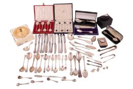 An agglomeration of small silver items, including a Patrick Mavros silver and African black wood fig